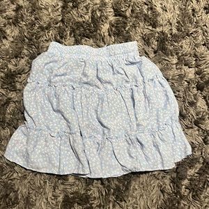 selling blue ruffle skirt from princess polly fits tight ish on waistband
